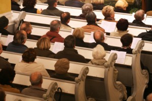 © 2006 Alex Nikada, "Praying at church", via iStockphoto.